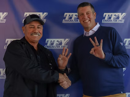 TFY President Jay Calavan with three-million mile driver Alberto Barbosa